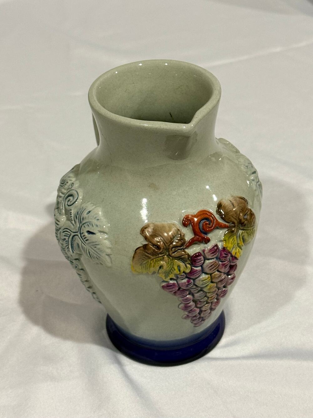 Vintage KING Handmade Germany Pottery Pitcher Relief Grapes Blue Base Stoneware
